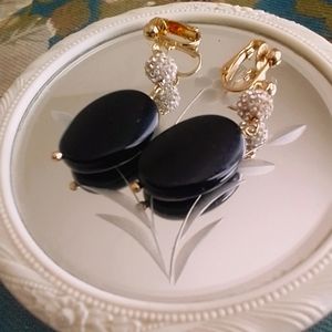 Vintage clip-on drop earrings in faux diamond, black, and gold.